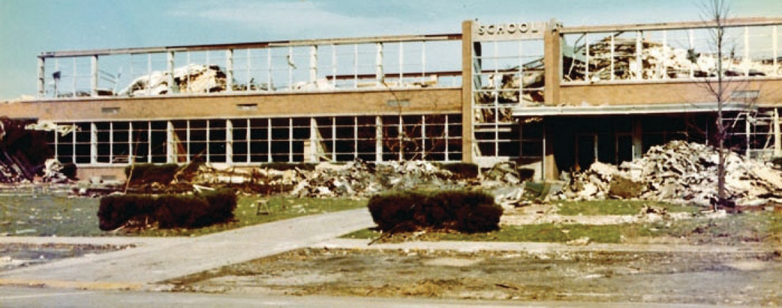 The tornado destroyed nine of the 12 school buildings in Xenia, including the high school (right), but mercifully struck an hour after students had been dismissed for the day (photograph courtesy of the National Weather Service).