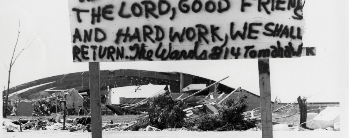 A sign erected by Duteil Ward became the iconic representation of Xenia’s resolve to rebuild after the 1974 tornado (photograph by Al Wilson of the Dayton Journal Herald/courtesy of the Greene County Ohio Historical Society).