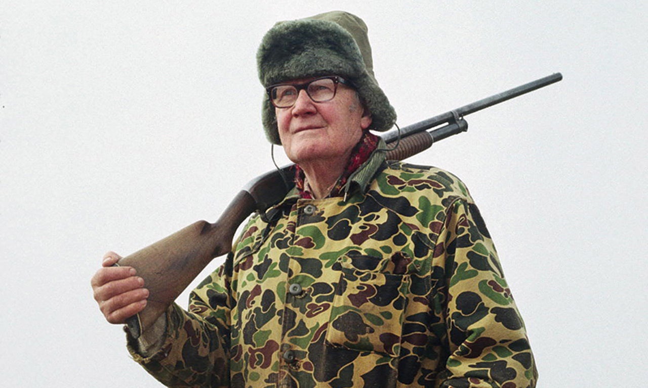 Merrill Gilfillan holding a hunting rifle