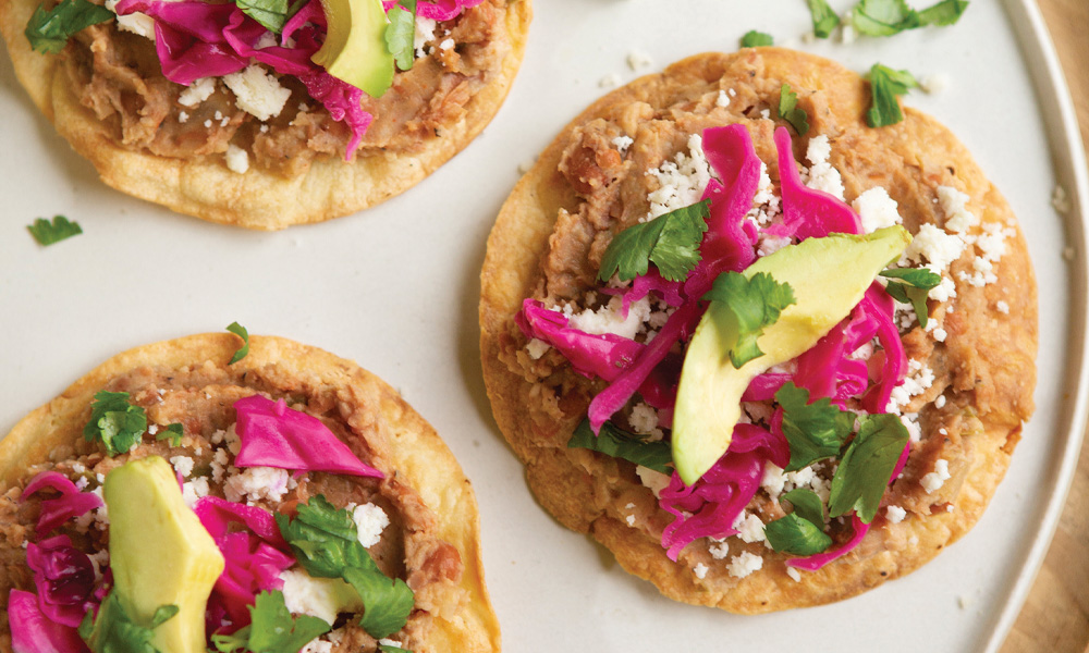 Refried Bean and Pickled Cabbage Tostadas