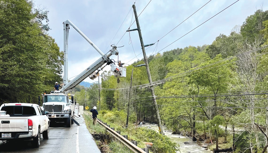 Lineworkers helping with power restoration after hurricanes in 2024