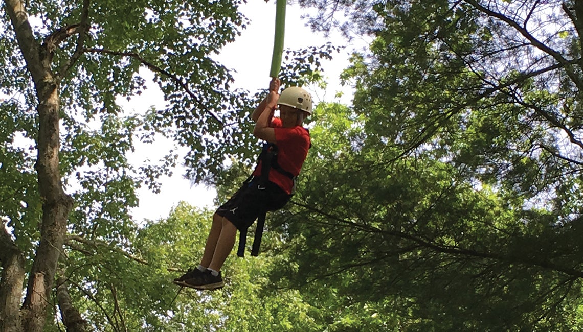 Boy on a zipline