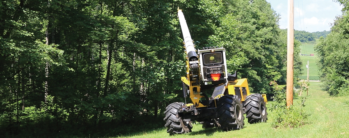 Frontier Power Company uses a Jarraff all-terrain tree trimmer to clear foliage away from the power line right-of-way.