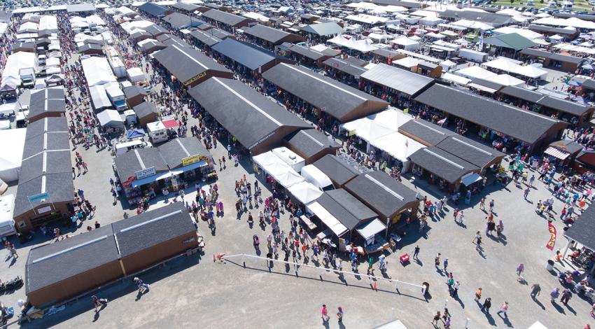 An overhead shot of Shipshewana Trading Place Auction & Flea Market packed with visitors.