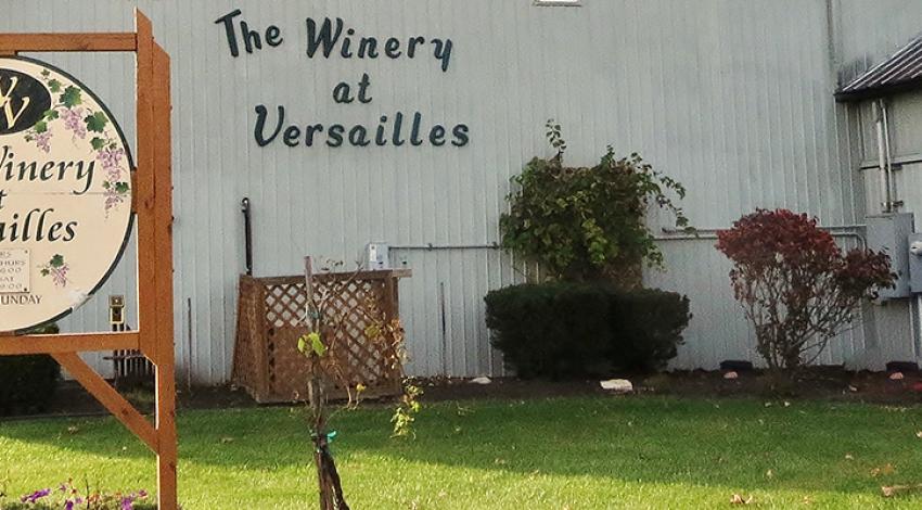 A picture of the Winery at Versailles sign.
