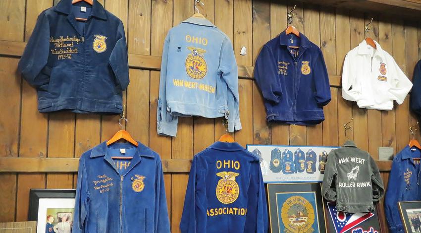 On the wall at Universal Lettering is a display of FFA jackets from different eras.