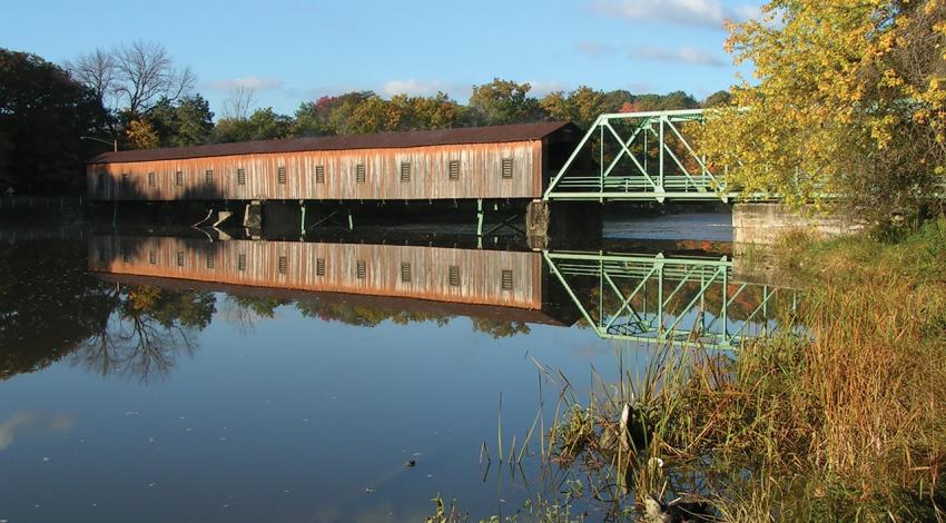 A landscape shot of Harpersfield Bridge above the water.