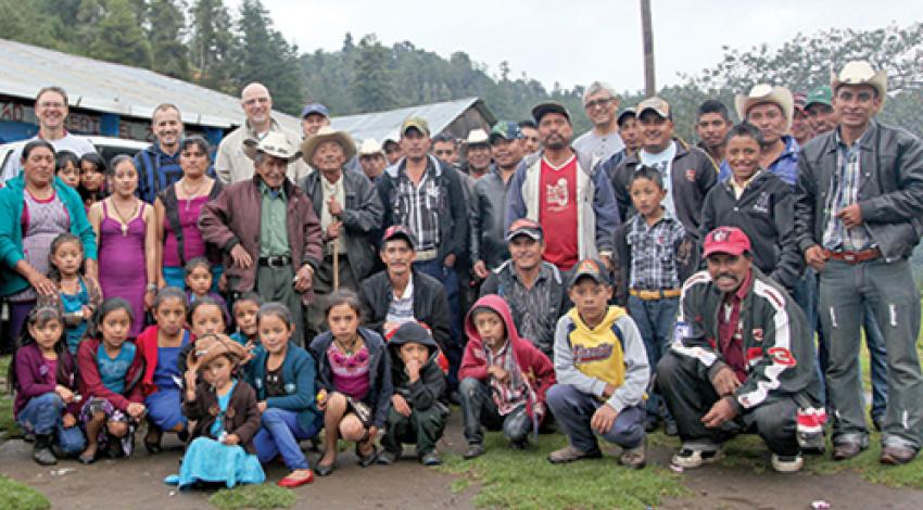 Villagers of La Soledad smile for a group photo.