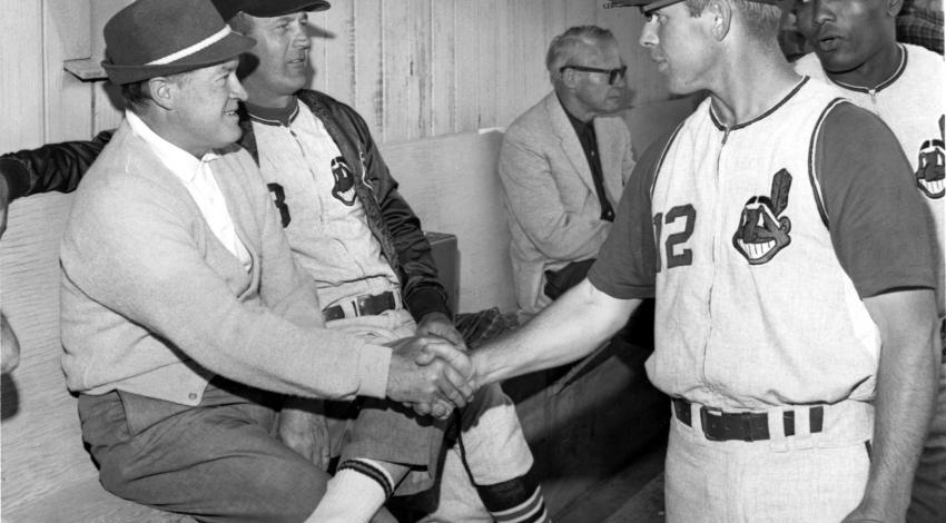 Bob Hope chats with Indians players during his time as co-owner of the team (photo courtesy of the Cleveland Guardians).