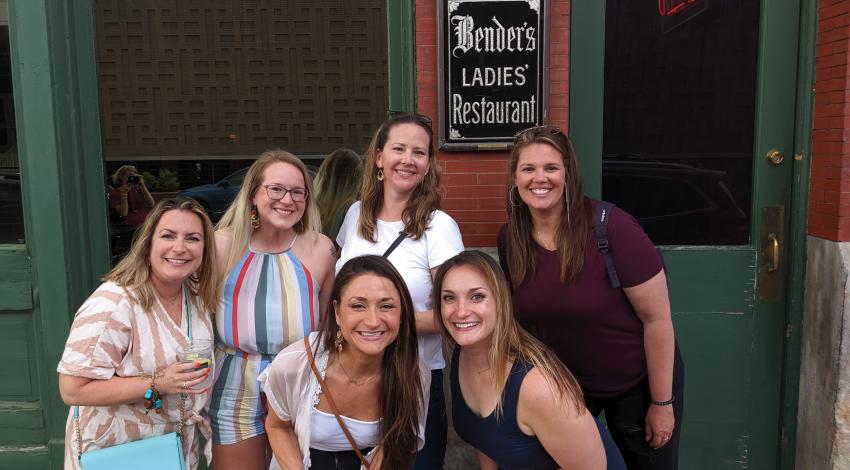 Best friends Katie Helfrich, Kim Fulks, Stephanie Snee, Marella Murphy, Summery Rowlands, and Brittany Buch pose for pictures while embarking on a night out with Canton Food Tours.
