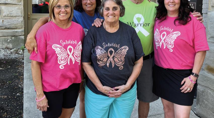 Julie Hohenstein (far right) relied on the support of her family during treatment for breast cancer, but was grateful to Pink Ribbon Girls for filling in the gaps.  