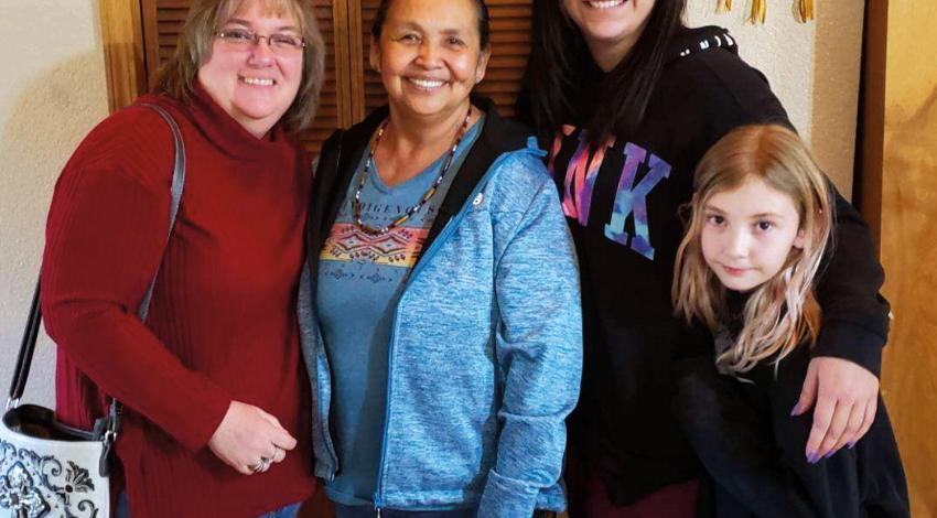 Tracy Elder (left) poses with chaplains Debra Homegun (center) and Jenn Buckley and Buckley’s daughter, Hayley, of the Native Nations Chaplaincy Alliance during a recent visit.