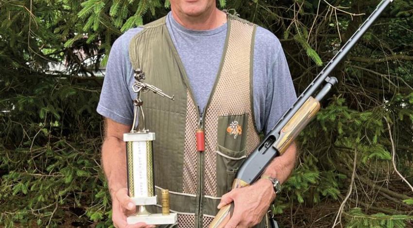 Dave Salmons with the trophy that gets passed around among the friends in his shooting group.