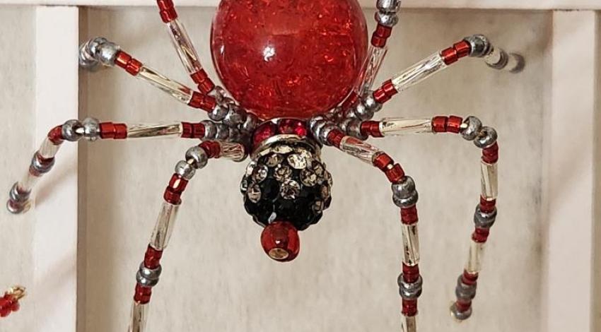 A Christmas spider made from precious stones and pearls