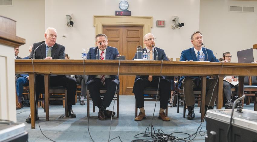 Pat O'Loughlin on a panel of other electric utility and environmental industry leaders