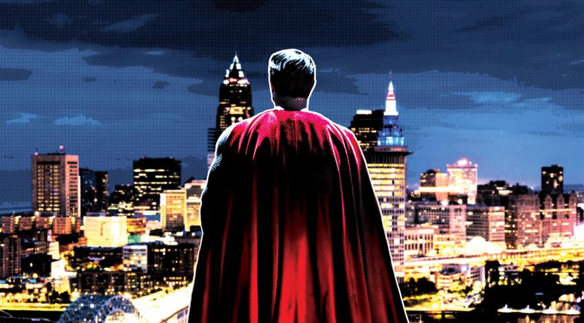 A comic drawing of Superman overlooking a city.