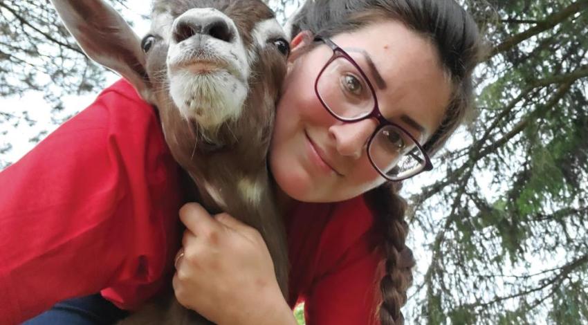 Rachel LaRue and one of her Toggenburg goats