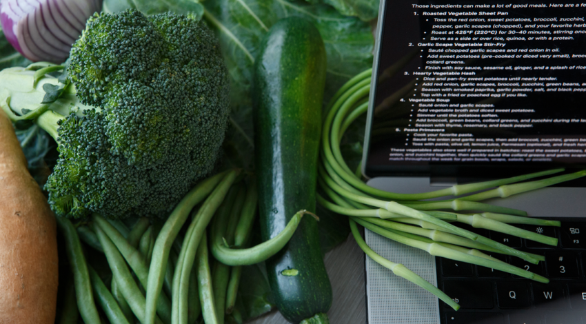 Vegetables beside a laptop