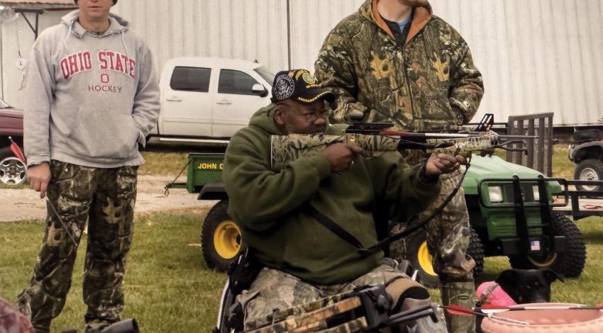 A veteran shooting a gun