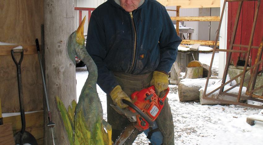Tim Kuenning carving with chainsaw