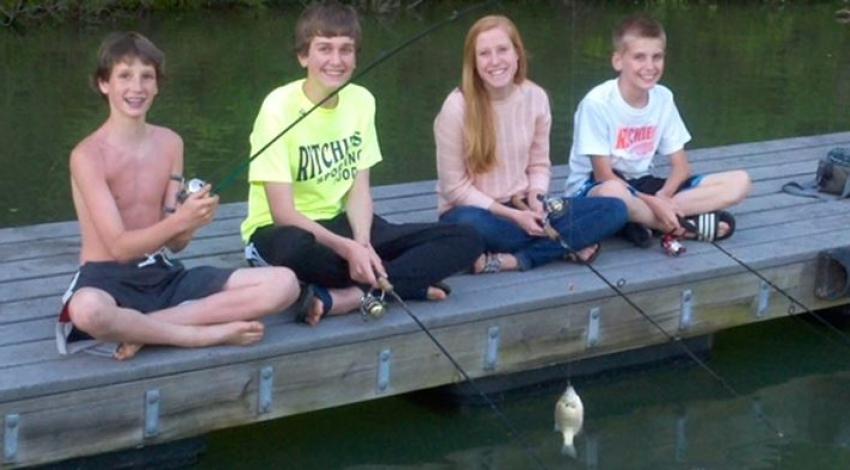 four kids fishing