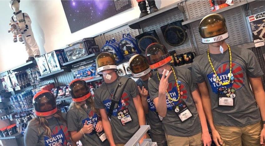 Six teenagers in space helmets and Youth Tour t-shirts