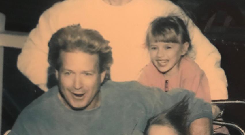 men and children on roller coaster