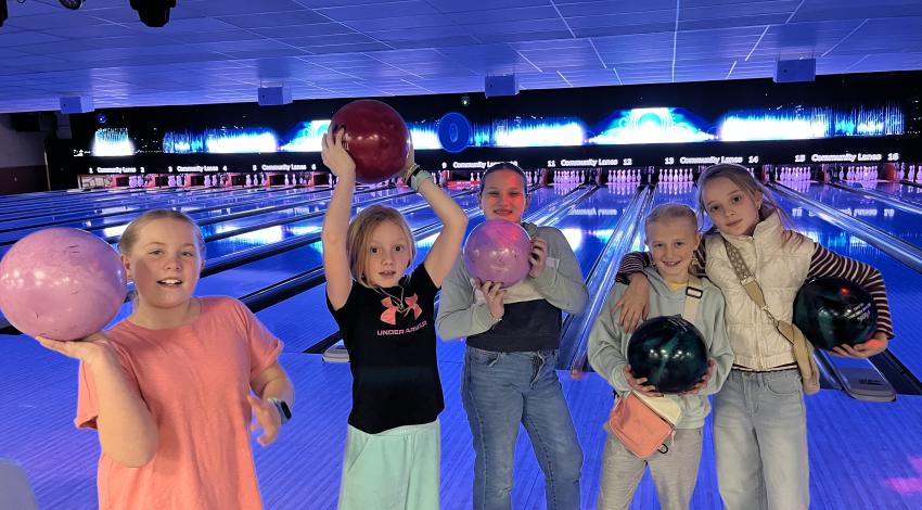group of kids in bowling alley