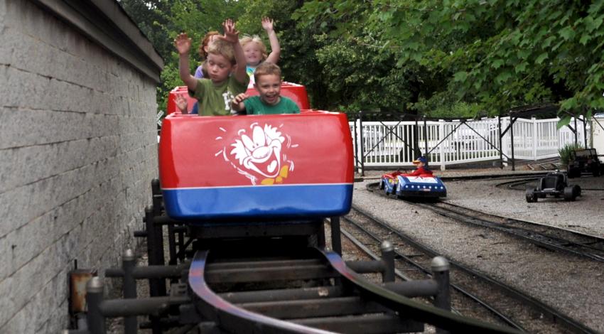 kids on red roller coaster