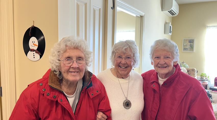 three smiling women