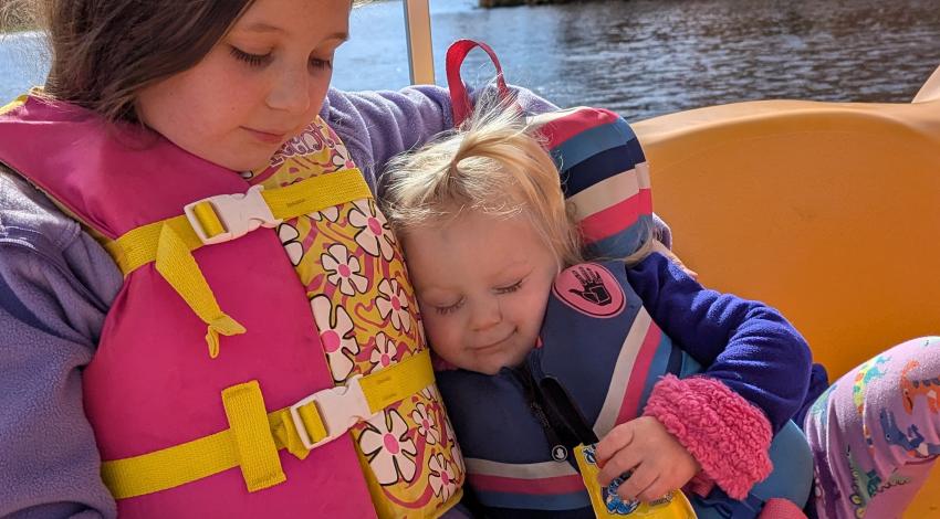 two little girls on a boat