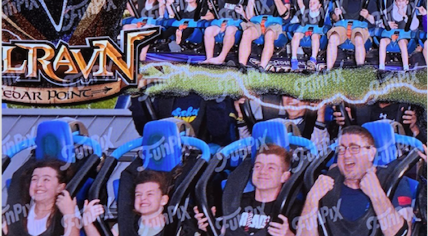 family on amusement park ride