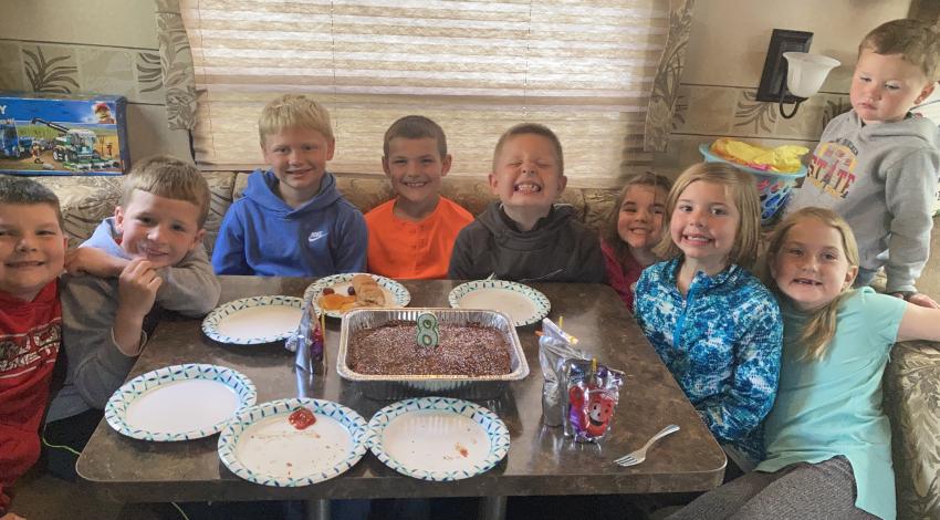 children around table