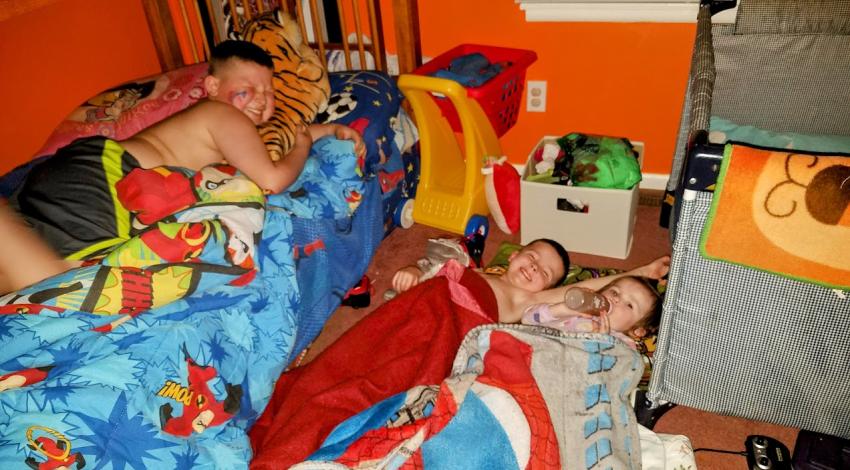 kids on bed on on floor