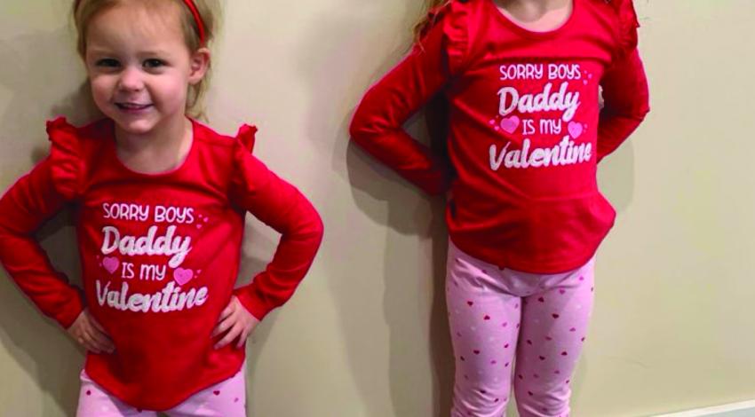 two little girls in heart headbands