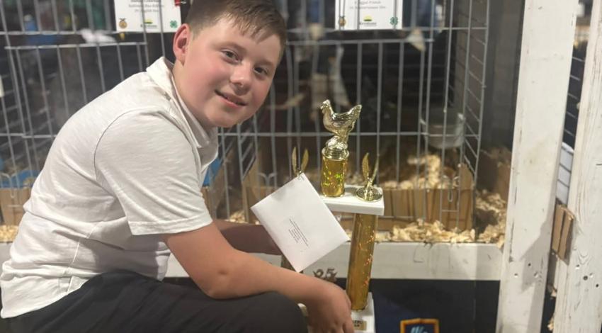boy with trophy