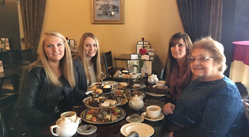four women having tea