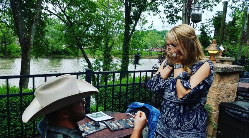 man knelt down in front of woman
