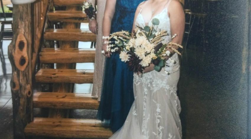 bride and three women on stairs