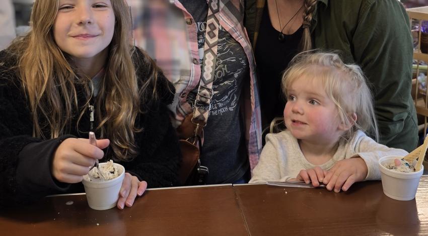 two women and two girls with ice cream