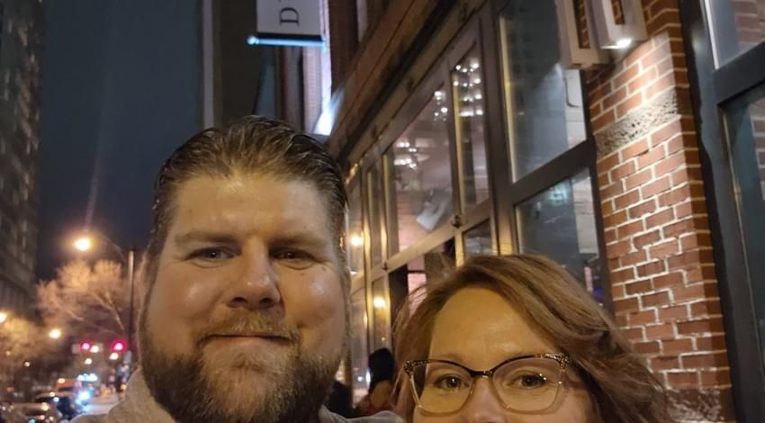 man and woman in front of restaurant