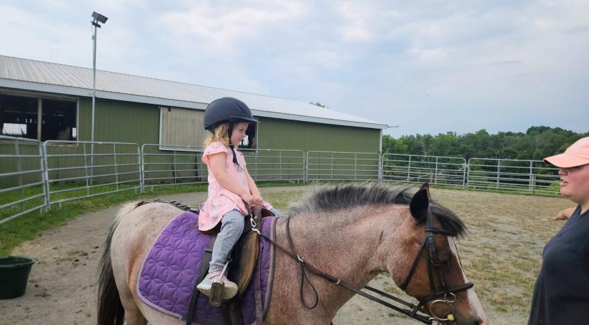 little girl on pony