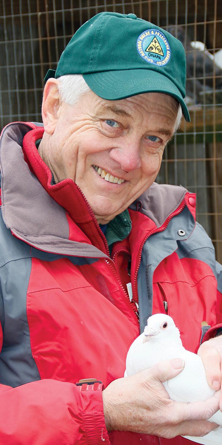 Guy Denny with pigeon