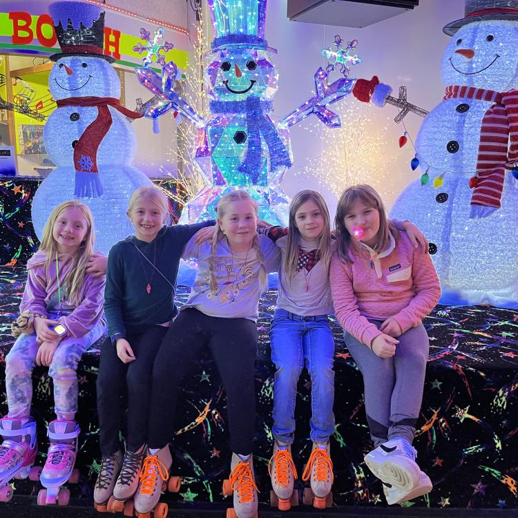 group of kids in roller skates
