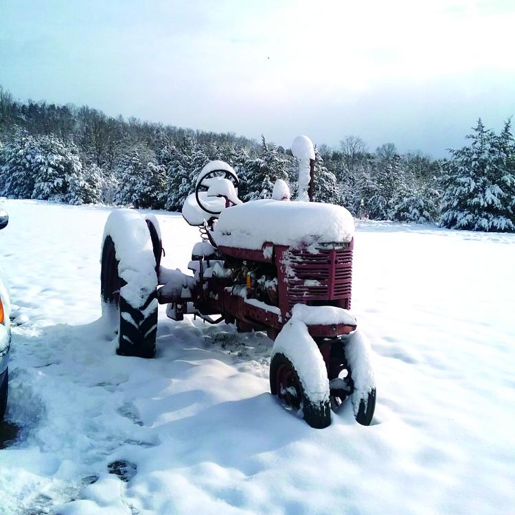 red tractor in the snow