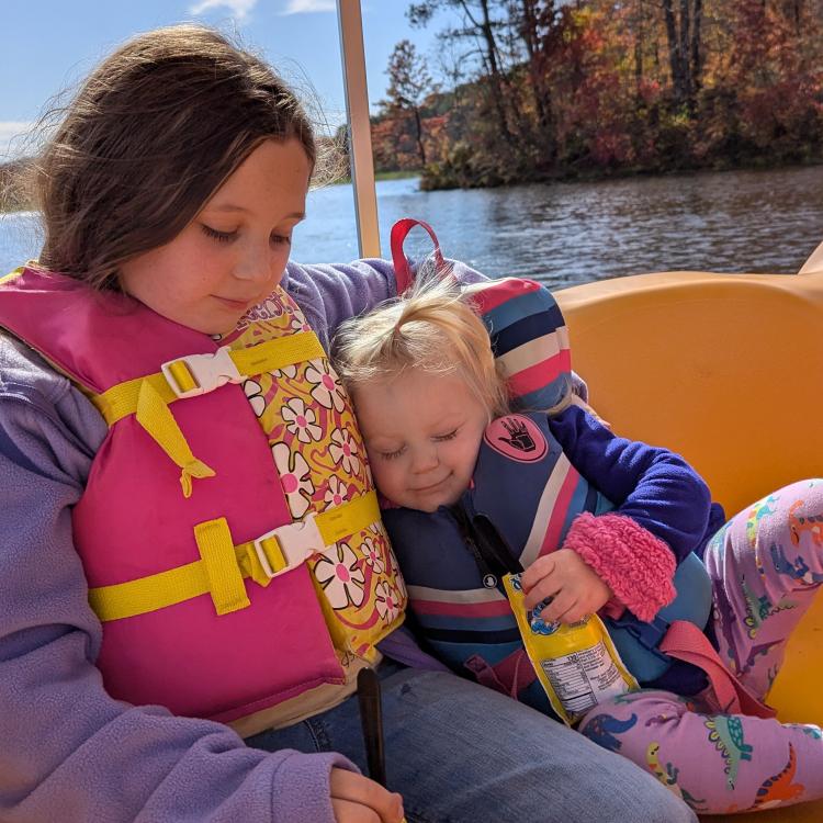 two little girls on a boat