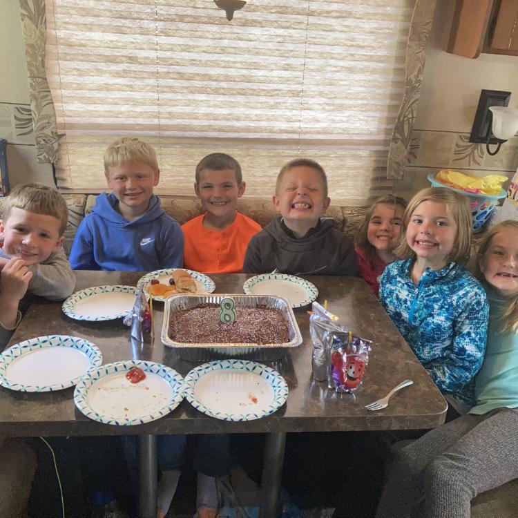 children around table