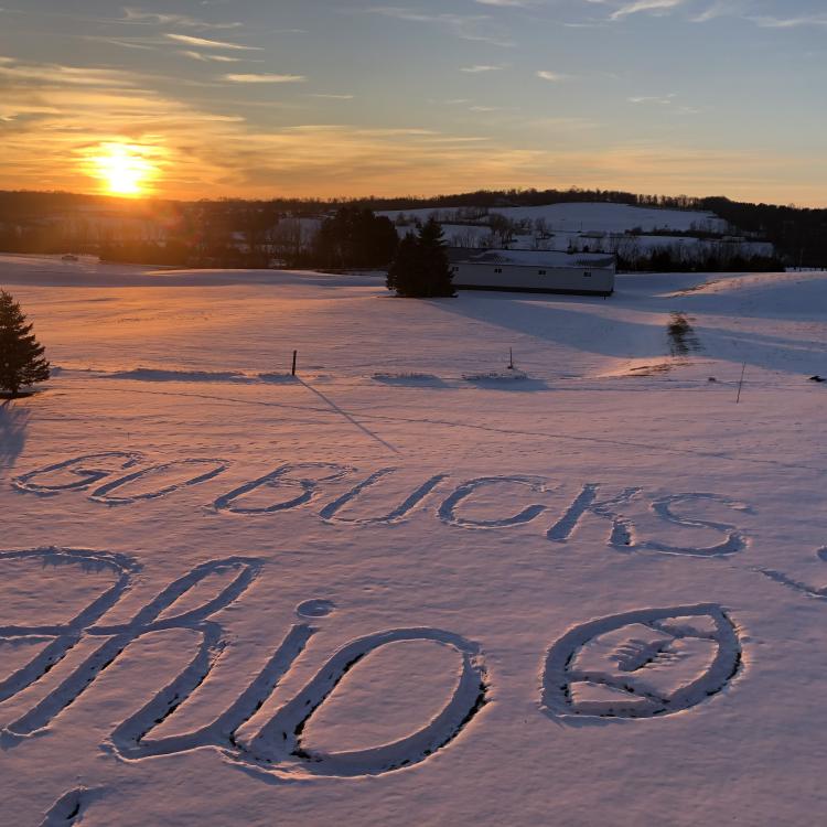 Ohio written in snowy field