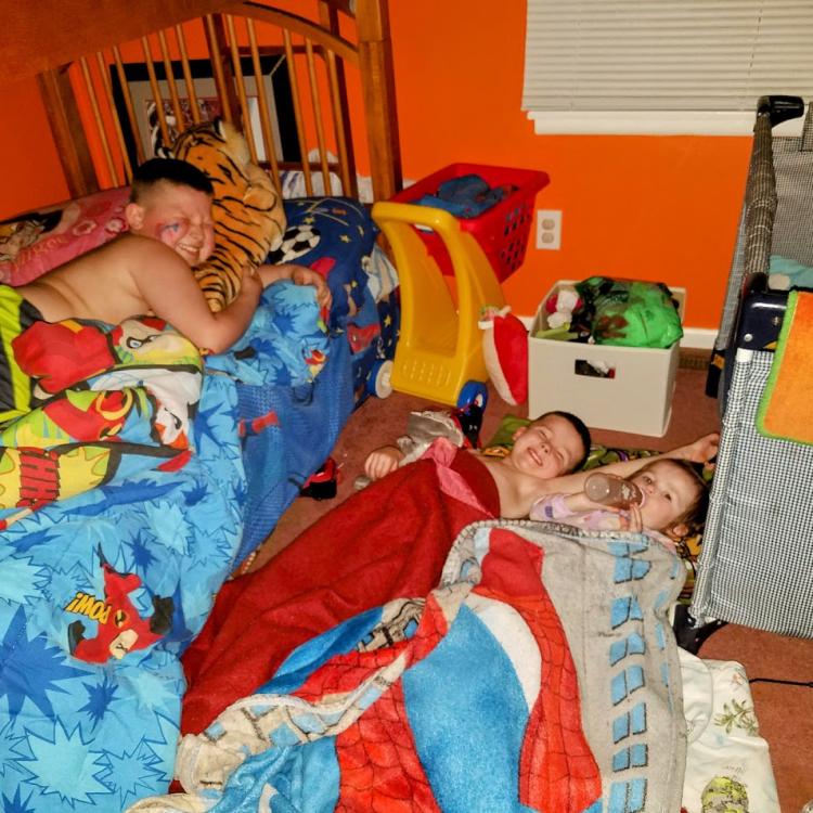 kids on bed on on floor