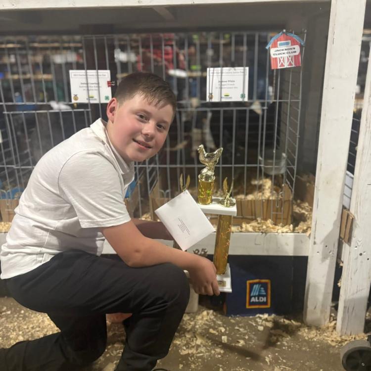 boy with trophy